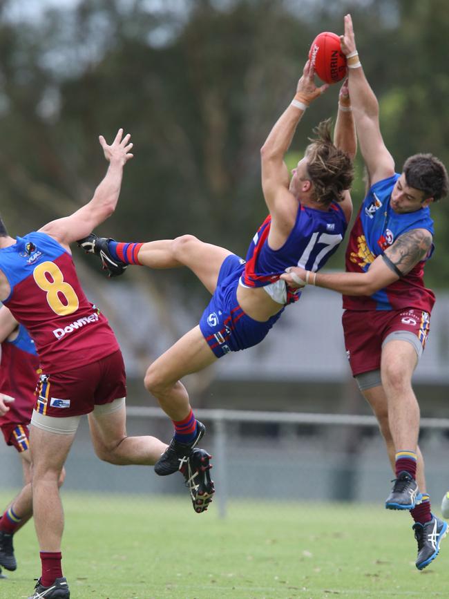 Football GDFL: Belmont Lions v Bell Post Hill Bell Post Hill 17 Will Ford takes a belter over Belmont Lions 8 Matthew Cimino and 42 Brad Storm ( right) Picture: Mark Wilson