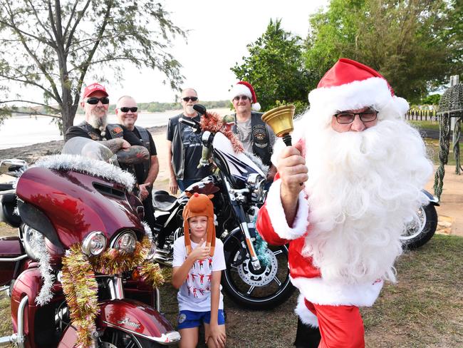 Darwin's Motorcycle Christmas Toy Run 2019 , Neil Spencer, Santa, Grub Stephens, Cagey Avery, Phillip Lodge and Jack Wrigley with Santa in front getting all geared up for the annual Christmas toy run. Picture KATRINA BRIDGEFORD.