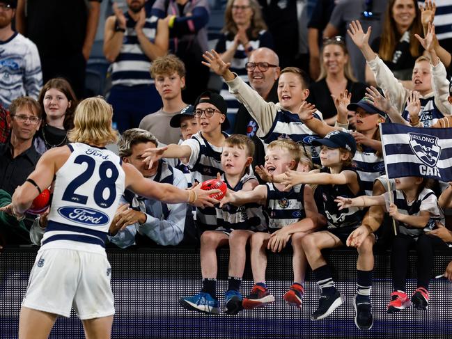 Ollie Dempsey and his new fans. Picture: Michael Willson/AFL Photos