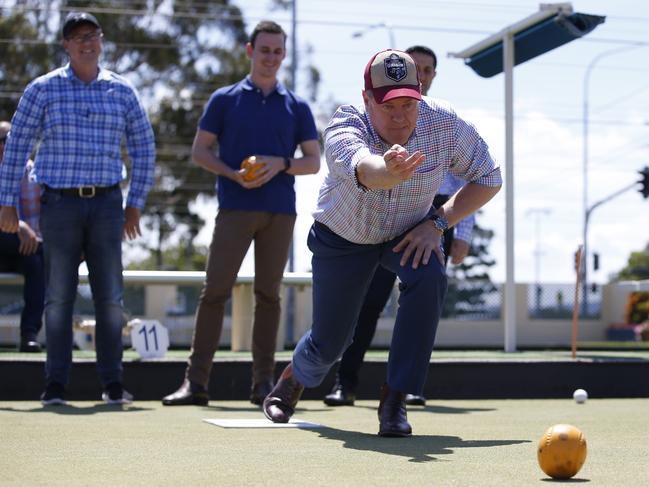 Queensland Opposition Leader Tim Nicholls plays bowls during a visit to Musgrave Hill Bowls Club, Gold Coast, Sunday, November 12, 2017. Mr Nichols announced that the LNP, if elected, will save seniors around $720 a year in cost of living relief. (AAP Image/Regi Varghese) NO ARCHIVING