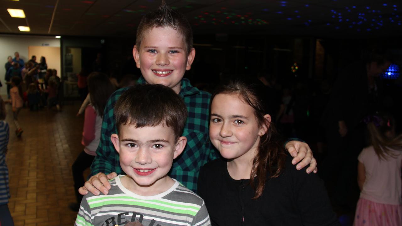 Noah Werner, Mia Werner and Lachie Stroud had a fantastic time at the Blue Light Disco on Friday night Photo Erin Smith / Stanthorpe Border Post