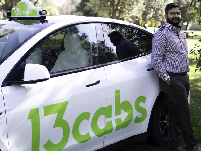 Melbourne 13cabs Driver Jatin Parbhakar in front of 13cabs electric taxi. Picture: Supplied