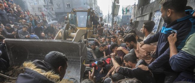 Palestinians searched for survivors on Wednesday following an Israeli attack on Rafah in the southern Gaza Strip. Picture: Mohammed Talatene/Zuma Press/WSJ