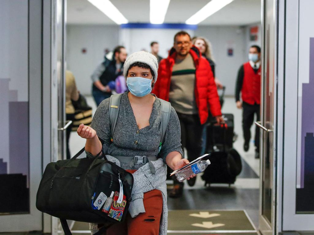 Travellers arrive at O’Hare Airport in Chicago, Illinois. Picture: Kamil Krzaczynski/AFP