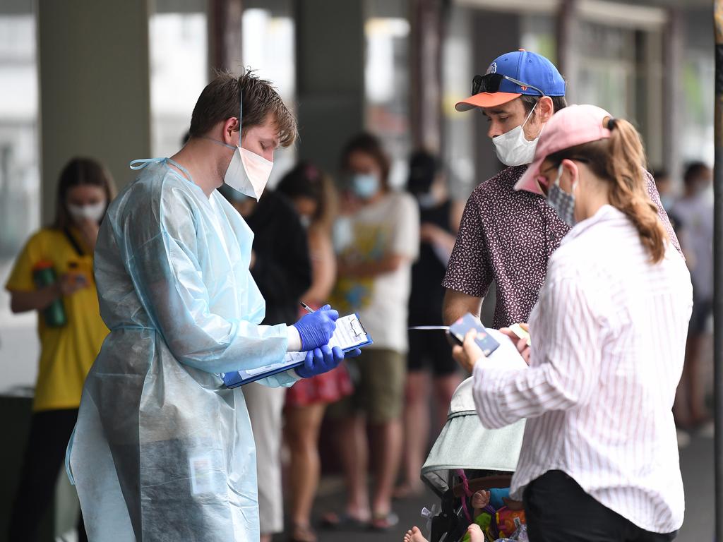 People line up for a Covid test outside a clinic near the Mater Hospital. Picture: NCA NewsWire / Dan Peled