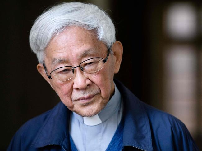 (FILES) In this file photo taken on March 5, 2018, Cardinal Joseph Zen, 86, former Bishop of Hong Kong, listens to a question during an interview with AFP in Hong Kong. - The arrest of 90-year-old retired Catholic cardinal Joseph Zen under Hong Kong's national security law has triggered international outrage and deepened concerns over China's crackdown on freedoms in the financial hub. (Photo by Anthony WALLACE / AFP)