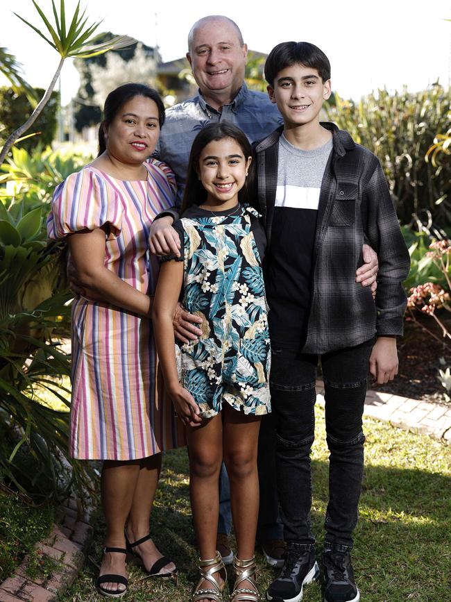 Mia Geise, 11 – pictured with her loving parents Michael and Annie, and brother Henry – received her second liver transplant almost a year ago. Picture: Josh Woning