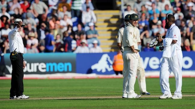 Ponting gives Shafayat some parting words to leave the pitch with.