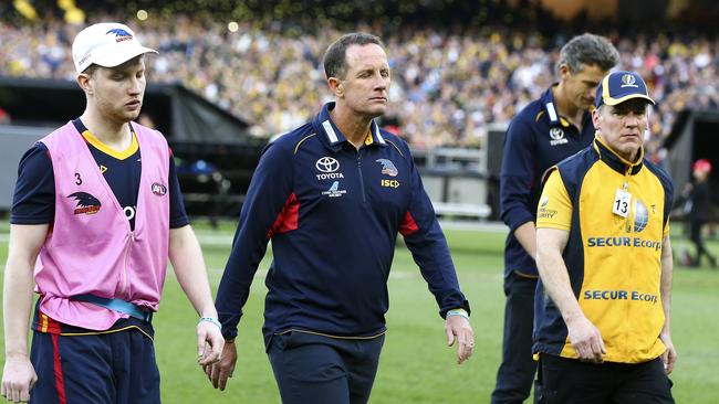 Don Pyke walks off the MCG after last year’s grand final loss. Picture: Sarah Reed