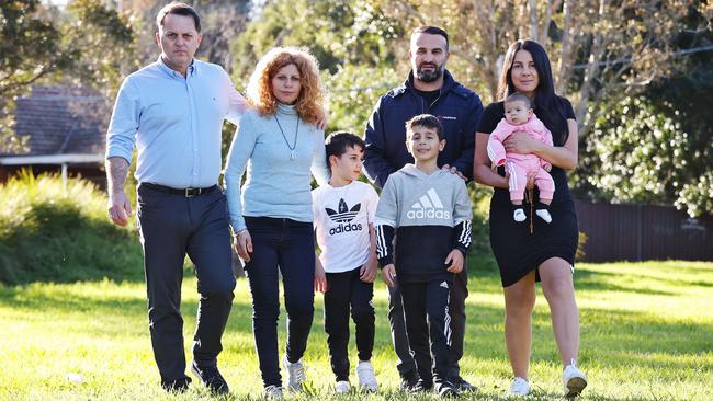 Craig Mackenzie and Bridget Sakr with Danny and Leila Abdallah and their children Michael and Alex and baby Selina. Picture: Sam Ruttyn