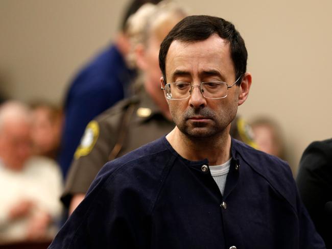 Former Michigan State University and USA Gymnastics doctor Larry Nassar addresses the court during the sentencing phase in Ingham County Circuit Court on January 24, 2018 in Lansing, Michigan.  Disgraced former USA Gymnastics doctor Larry Nassar was sentenced to 40 to 175 years in prison on Wednesday for sexually abusing scores of young girls under the guise of medical treatment. 