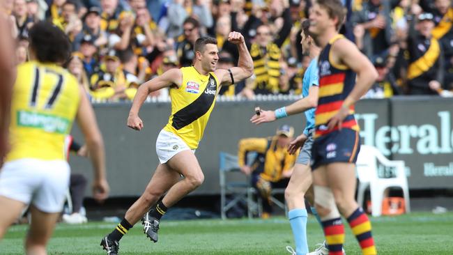 South Australian export Jack Graham kicks a goal in the third quarter as Richmond runs rampant. Picture: Alex Coppel.