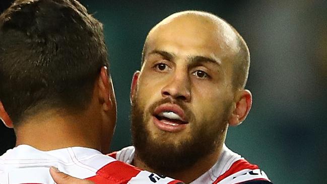 Blake Ferguson of the Roosters celebrates a try.