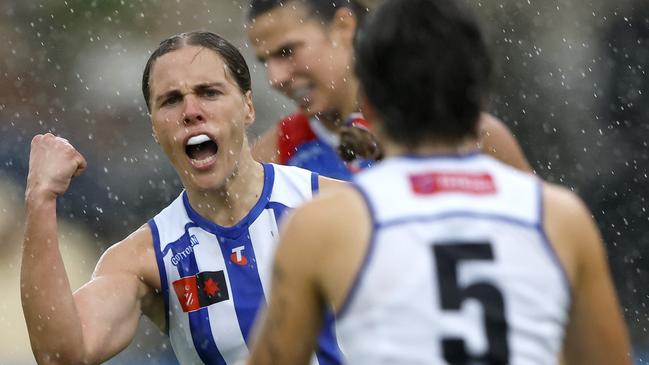 MELBOURNE, AUSTRALIA - OCTOBER 05: Jasmine Garner of the Kangaroos celebrates a goal during the round six AFLW match between North Melbourne Kangaroos and Western Bulldogs at Arden Street Ground, on October 05, 2024, in Melbourne, Australia. (Photo by Darrian Traynor/AFL Photos/via Getty Images)