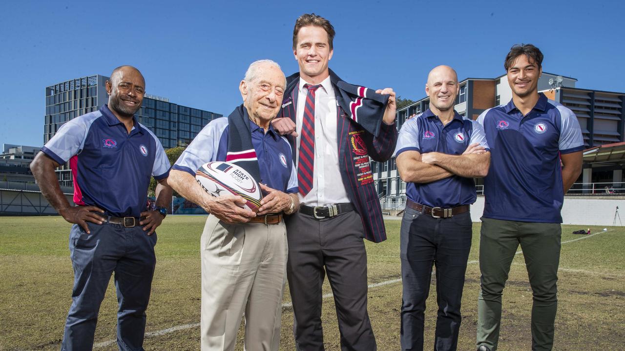 Former Wallaby Mosese Raulini, Dr Nick Girdis First XV captain and school captain in 1943, 2021 team captain and current school captain, Luke Hatherall, current Wallaby Jordan Petaia and former Wallaby Mark Bartholemeusz on the pitch at Brisbane State High. Picture Lachie Millard