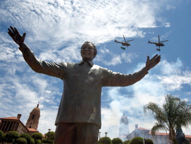 Don’t deny the power of hope: A nine metre high statue of former President Nelson Mandela is unveiled in Pretoria, South Africa.