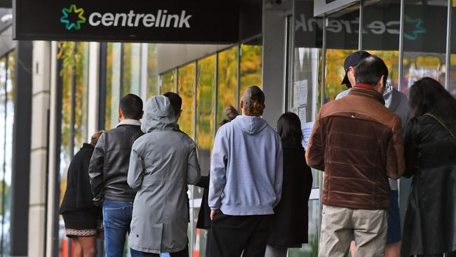 People queue outside a Centrelink office in Melbourne at the height of Covid. Picture: William West/AFP