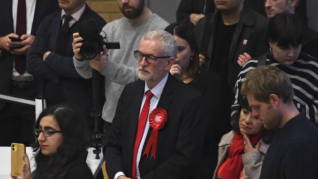 Jeremy Corbyn and his wife Laura Alvarez wait for the declaration of his seat. Picture: AP.