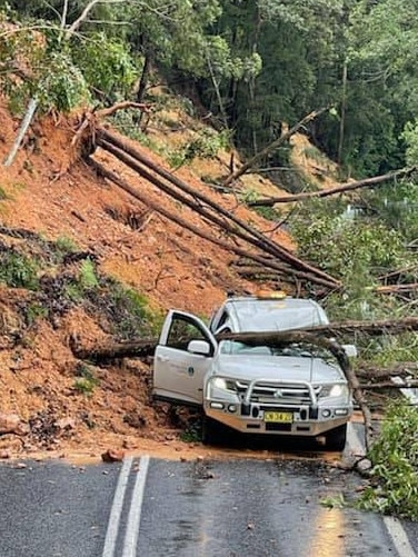 Heavy rainfall triggered a landslide leaving a car stranded at Dorrigo.