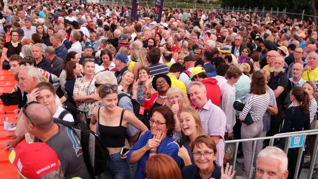 A lot of people are queued at Pacific Fair interchange for transport to the opening ceremony at Carrara. Photo by Richard Gosling