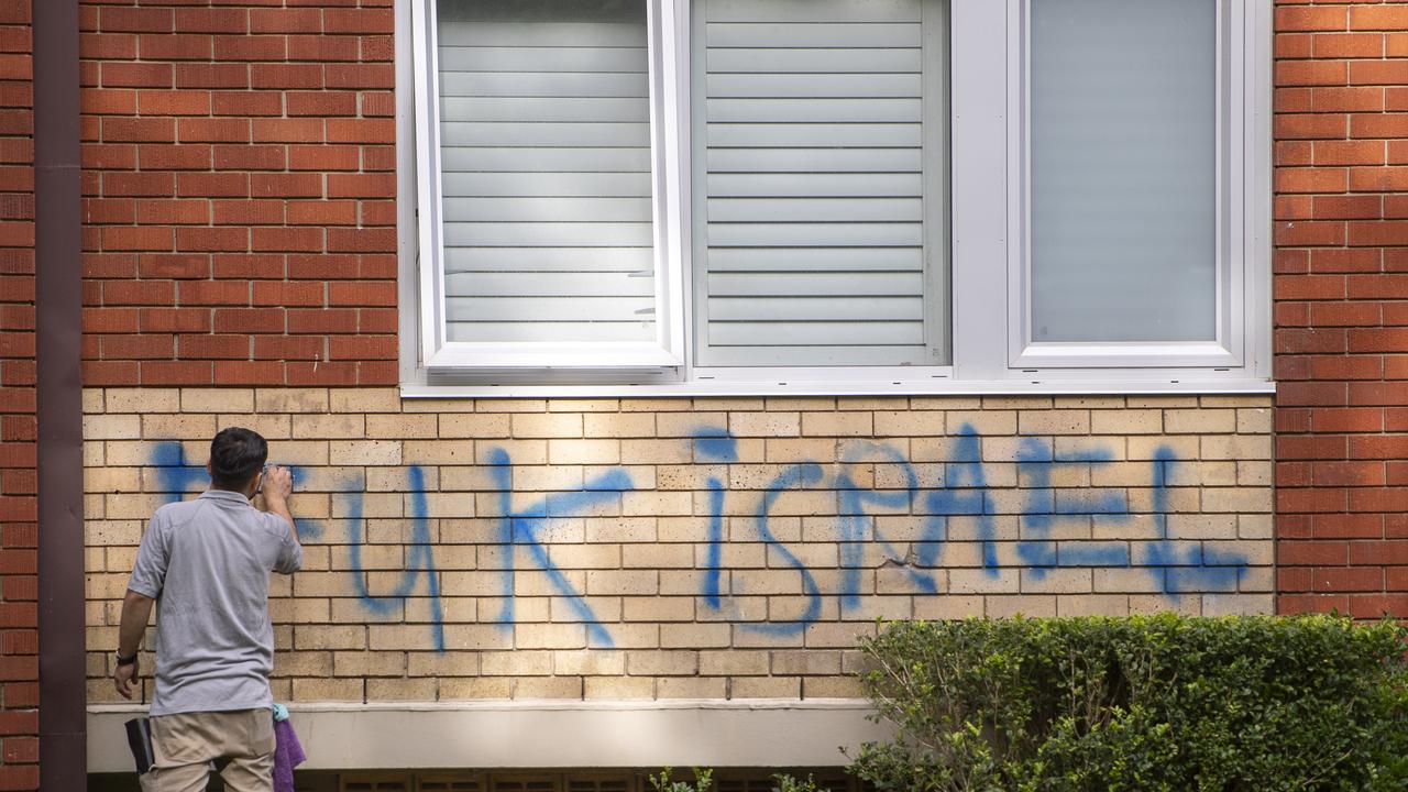 Buildings and cars were spray painted with anti-Semitic graffiti during the attack. Picture: NewsWire / Jeremy Piper