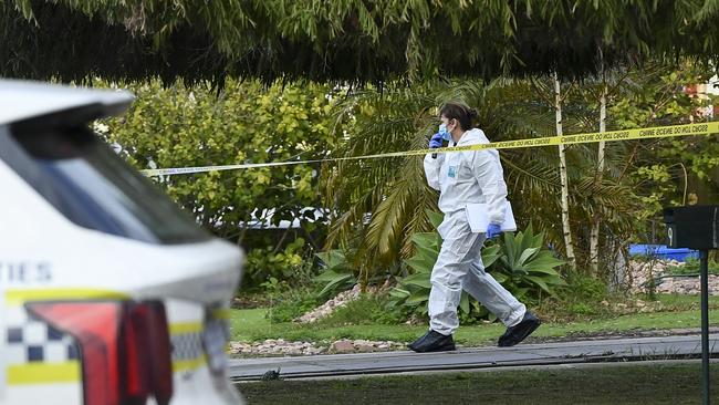 Forensic crime investigators at the scene. Picture: Mark Brake