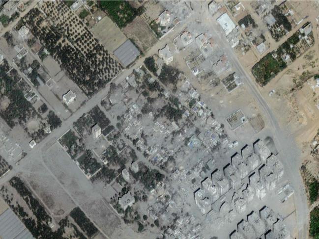(COMBO) This combination of pictures created on October 25, 2023 shows (top) this handout satellite picture courtesy of Maxar Techonologies show an overview of Atrara in Gaza Strip on May 10, 2023, and (bottom) this handout satellite picture courtesy of Maxar Techonologies show an overview of Atrara in Gaza Strip on October 21, 2023. Thousands of civilians, both Palestinians and Israelis, have died since October 7, 2023, after Palestinian Hamas militants based in the Gaza Strip entered southern Israel in an unprecedented attack triggering a war declared by Israel on Hamas with retaliatory bombings on Gaza. (Photo by Satellite image Â©2023 Maxar Technologies / AFP) / RESTRICTED TO EDITORIAL USE - MANDATORY CREDIT "AFP PHOTO / Satellite image Â©2023 Maxar Technologies" - NO MARKETING NO ADVERTISING CAMPAIGNS - DISTRIBUTED AS A SERVICE TO CLIENTS