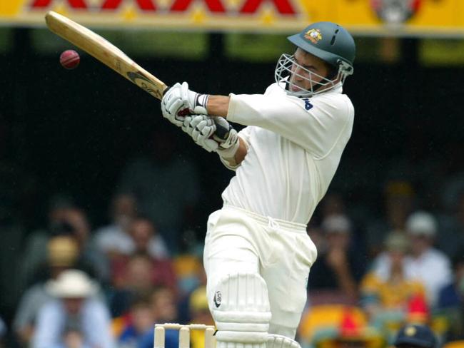 DECEMBER 4, 2003: Batsman Justin Langer plays pull shot during first test of Australia v India series at the Gabba in Brisbane, 04/12/03. Pic Glenn Barnes.Cricket A/CT