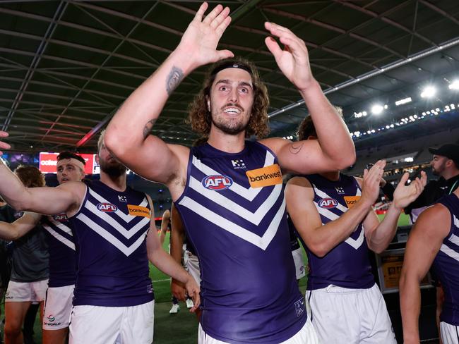 MELBOURNE, AUSTRALIA - MARCH 23: Luke Jackson of the Dockers leaves the field after a win during the 2024 AFL Round 2 match between the North Melbourne Kangaroos and the Fremantle Dockers on March 23, 2024 in Melbourne, Australia. (Photo by Dylan Burns/AFL Photos via Getty Images)