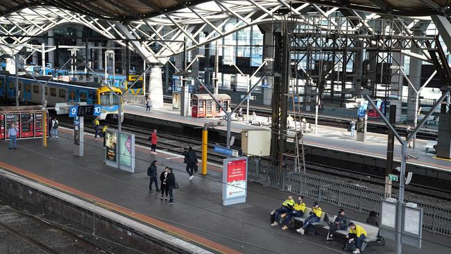 Commuters at Southern Cross Station yesterday. Picture: AAP Image/Stefan Postles