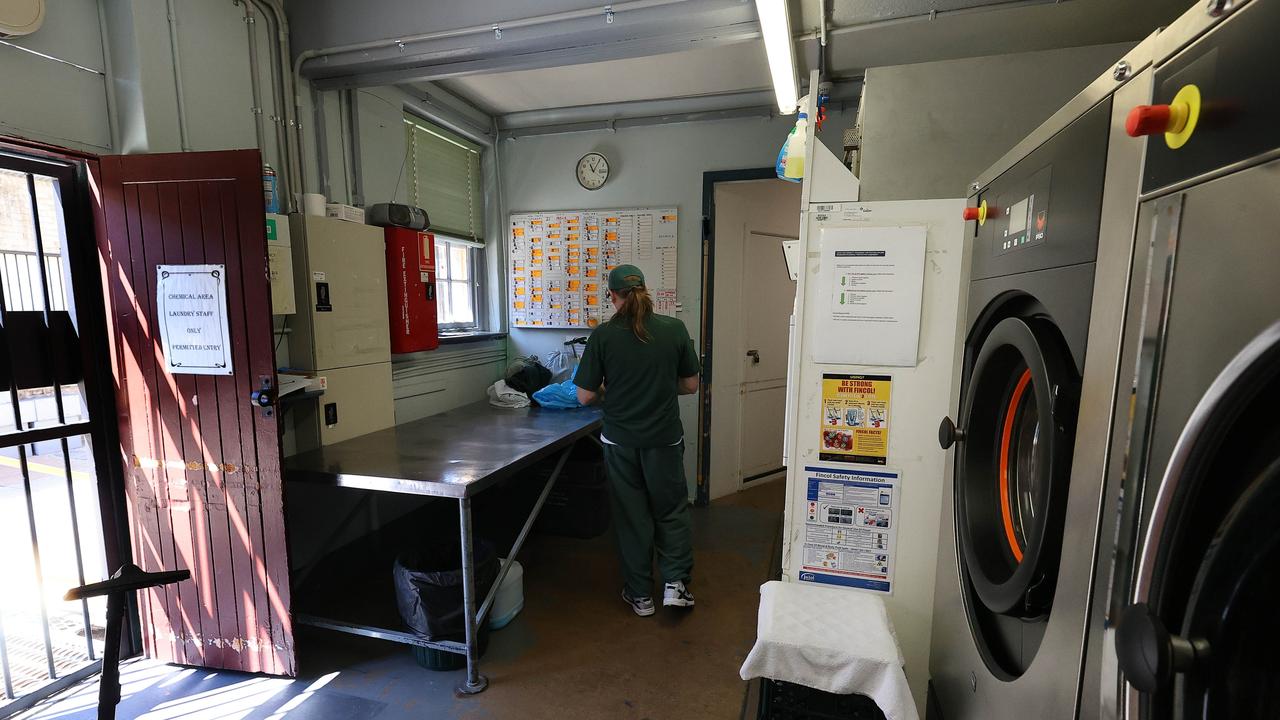 An inmate working in the laundry. Picture: Gary Ramage