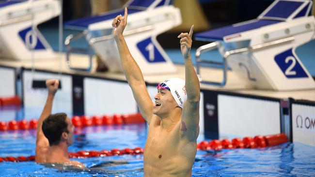 Sun Yang celebrates winning the men's 200m freestyle final at the 2016 Olympic in Brazil. (AAP Image/Lukas Coch)