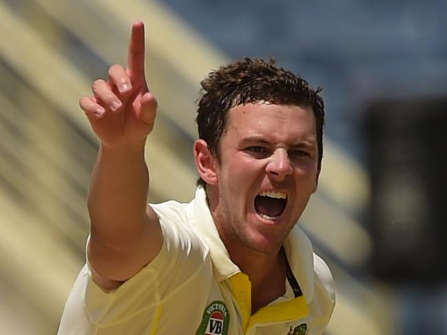 Australia's Josh Hazlewood reacts as he dismisses West Indies' Jermaine Blackwood on day four of the second cricket Test between Australia and the West Indies, June 14, 2015 at Sabina Park in Kingston, Jamaica. AFP PHOTO / ROBYN BECK