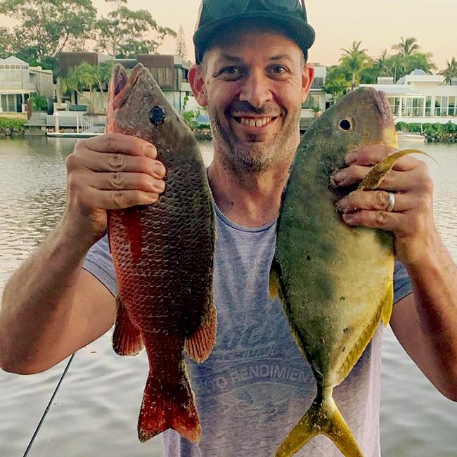 GOTCHA - Derick Payne with a mangrove jack and golden trevally which he caught in the lower Noosa Estuary. Photo: www.fishingnoosa.com.au