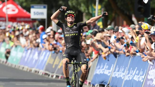 Alex Edmondson celebrates as he crosses the line to win the national cycling championship in Buninyong. Picture: Con Chronis