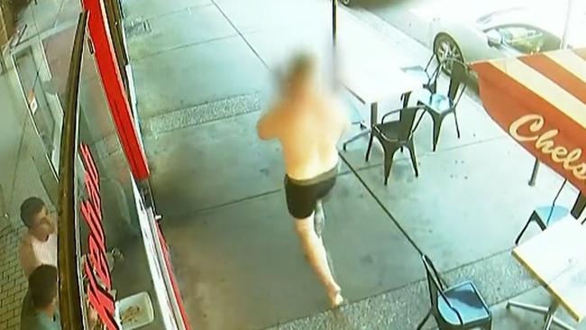 CCTV footage shows the distressed father after he realises his car was allegedly stolen with his toddler in the back seat. Picture: Nine News