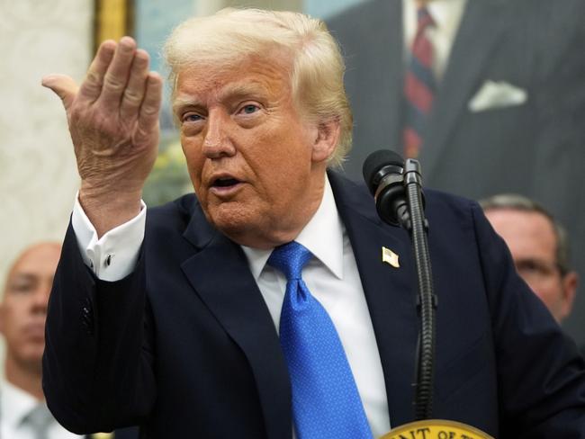 President Donald Trump speaks during an event to present law enforcement officers with an award in the Oval Office at the White House, Monday, May 19, 2025. (AP Photo/Manuel Balce Ceneta)