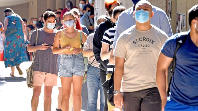 People line up to get vaccinated at the Brisbane vaccination hub at the Brisbane Convention and Exhibition Centre on Monday. Picture: NCA NewsWire / John Gass