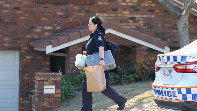 Police at the scene at Renfrew Drive, Highland Park, where a 27 year old female was shot. Picture Glenn Hampson