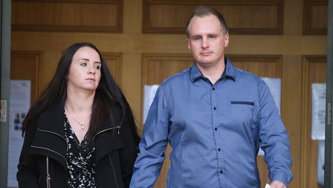 Emily Walker and Justin Lees leave the Adelaide Magistrates Court while facing charges of running an $18 million two-state fraud syndicate. Picture: Brenton Edwards.