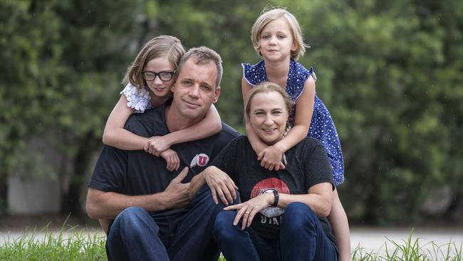 The Elliott family, Libby, 9, Cameron, Kaitlyn, 6, and Jen, will run in the Cupid’s Undie Run in Canberra this month to raise funds for a potential cure for neurofibromatosis. Picture: AAP/Matthew Vasilescu