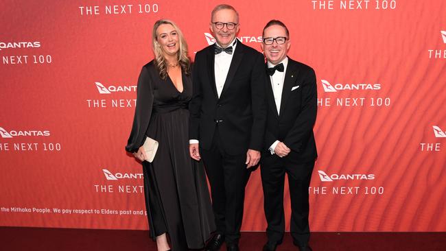 Anthony Albanese and fiancee Jodie Haydon with the then Qantas chief Alan Joyce at the airline’s 100th Gala Dinner in 2023. Picture: Getty Images