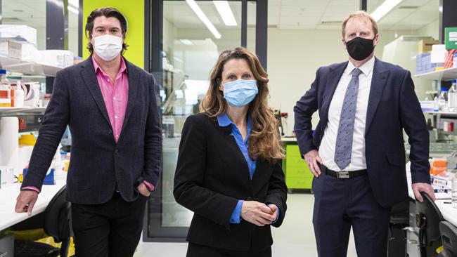 Amplia Therapeutics chief science officer Mark Devlin, left, acting chief executive of Cancer Therapeutics CRC Lisa Dube, and Amplia Therapeutics chief executive John Lambert at the Victoria Comprehensive Cancer Centre. Picture: Aaron Francis