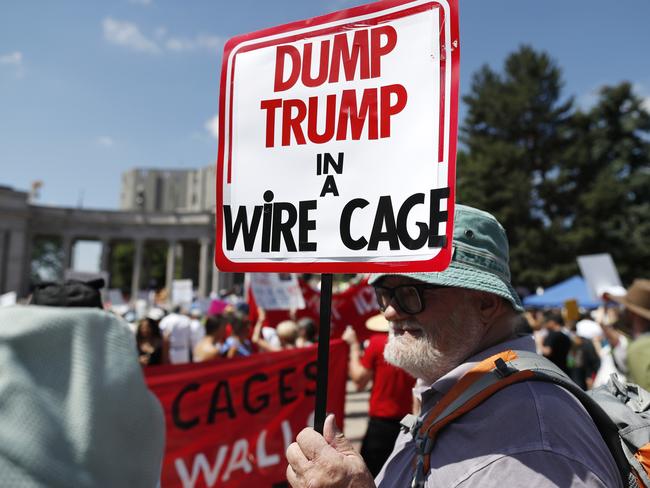 A protester holds up a sign during an immigration rally and protest in Civic Center Park Saturday, June 30, 2018, in downtown Denver, Colorado. Picture: AP/David Zalubowski