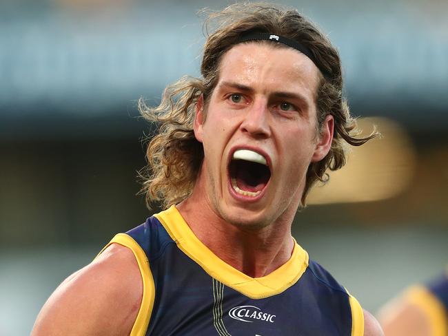 BRISBANE, AUSTRALIA - AUGUST 23: Jarrod Berry of the Lions celebrates a goal during the round 13 AFL match between the Brisbane Lions and the St Kilda Saints at The Gabba on August 23, 2020 in Brisbane, Australia. (Photo by Chris Hyde/Getty Images)