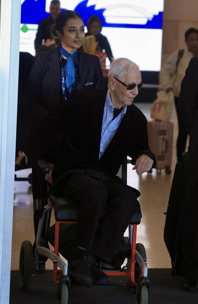 Paul Hogan was seen arriving at Sydney Airport on May 28, where he was pushed through the terminal in a wheelchair. Picture: ©MEDIA-MODE.COM