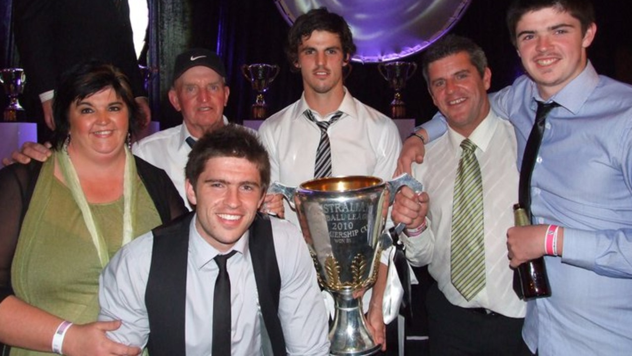 Scott Pendlebury with his family, mother Lisa, grandfather Peter, brother Kris, father Bruce and brother Ryan.