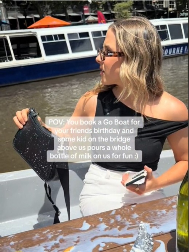 Videos show the teenager throwing milk off the Evan Walker Bridge in Southbank onto people in leisure boats below and bystanders almost being hit by a half-full milk bottle from a rooftop. Picture: Instagram