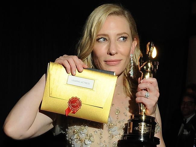 Cate Blanchett poses with her Oscar at the Governor's Ball following the 86th Academy Awards.