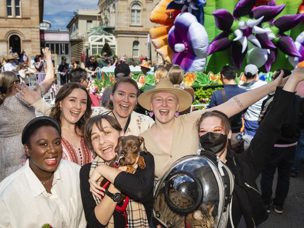 Having fun are (from left) Wez Drimly, Michaela Francis, Nicky Hauesler holding Chappy, Emmilyne Major, Brydie Symonds and Miranda Walker holding Lilith at the Grand Central Floral Parade of Carnival of Flowers 2022, Saturday, September 17, 2022. Picture: Kevin Farmer